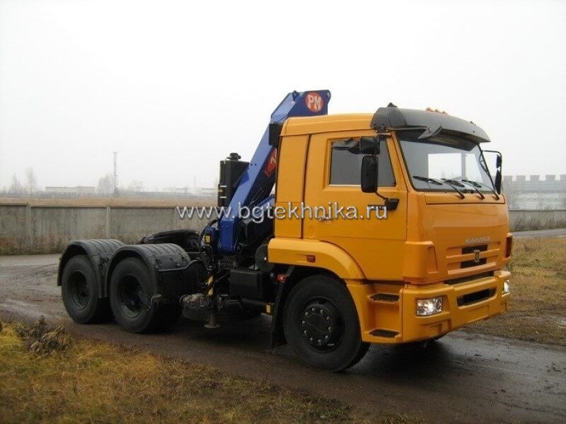 Седельный тягач КАМАЗ 65116 с КМУ РМ-14022