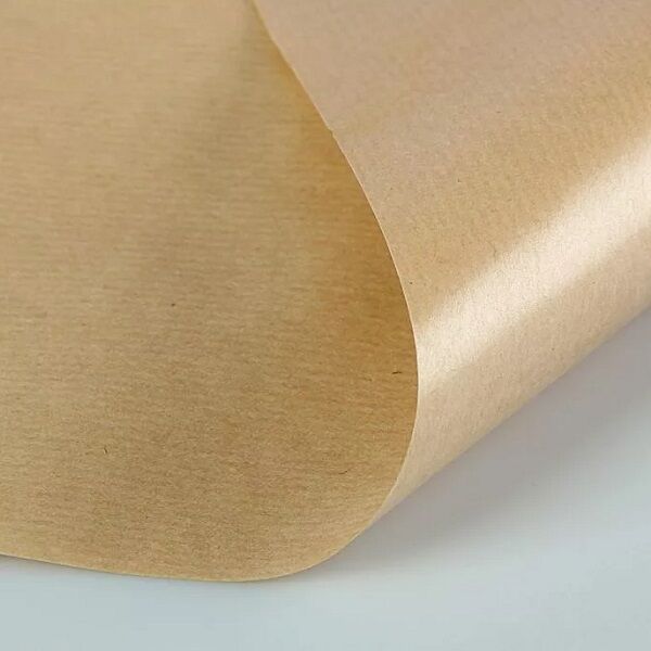 Крафт бумага тонкая, представляет собой обёрточный материал, состоящий из целлюлозы с длинными волокнами